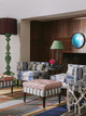 Atelier Veronique collection by Christopher Farr Cloth, photography by Christopher Horwood, styled by Virginia White. A room setting featuring Galaxie embroidered blue chairs in eclectic interior design.